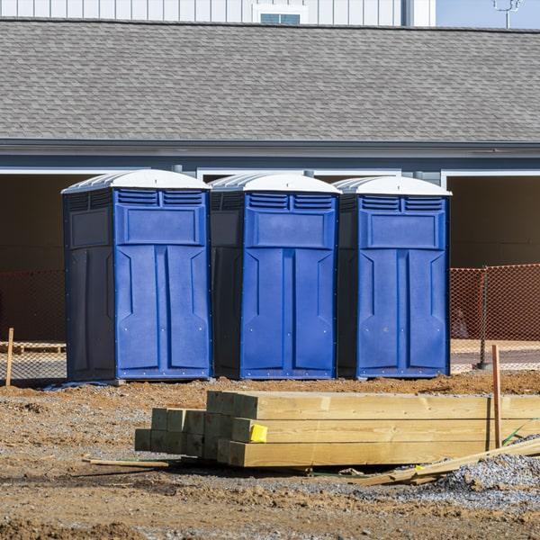 Portable toilet serving a construction site